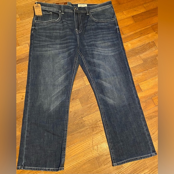 NWT Axle Slim Boot Cut Style with nice medium wash and button on back pockets - Picture 11 of 11